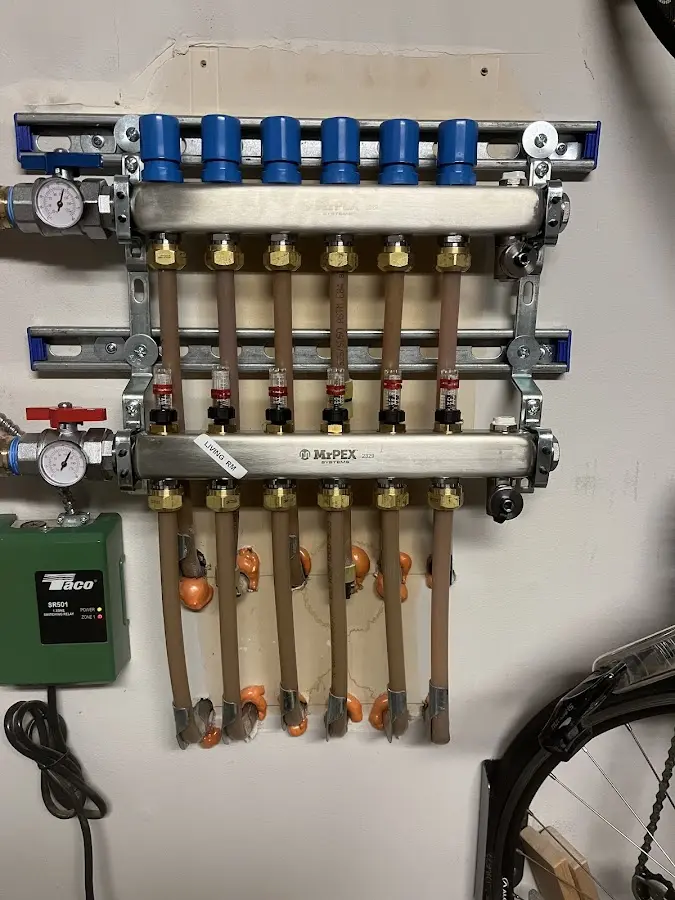 Plumber performing Water Heater Repair at a residential property in St. Pete Beach